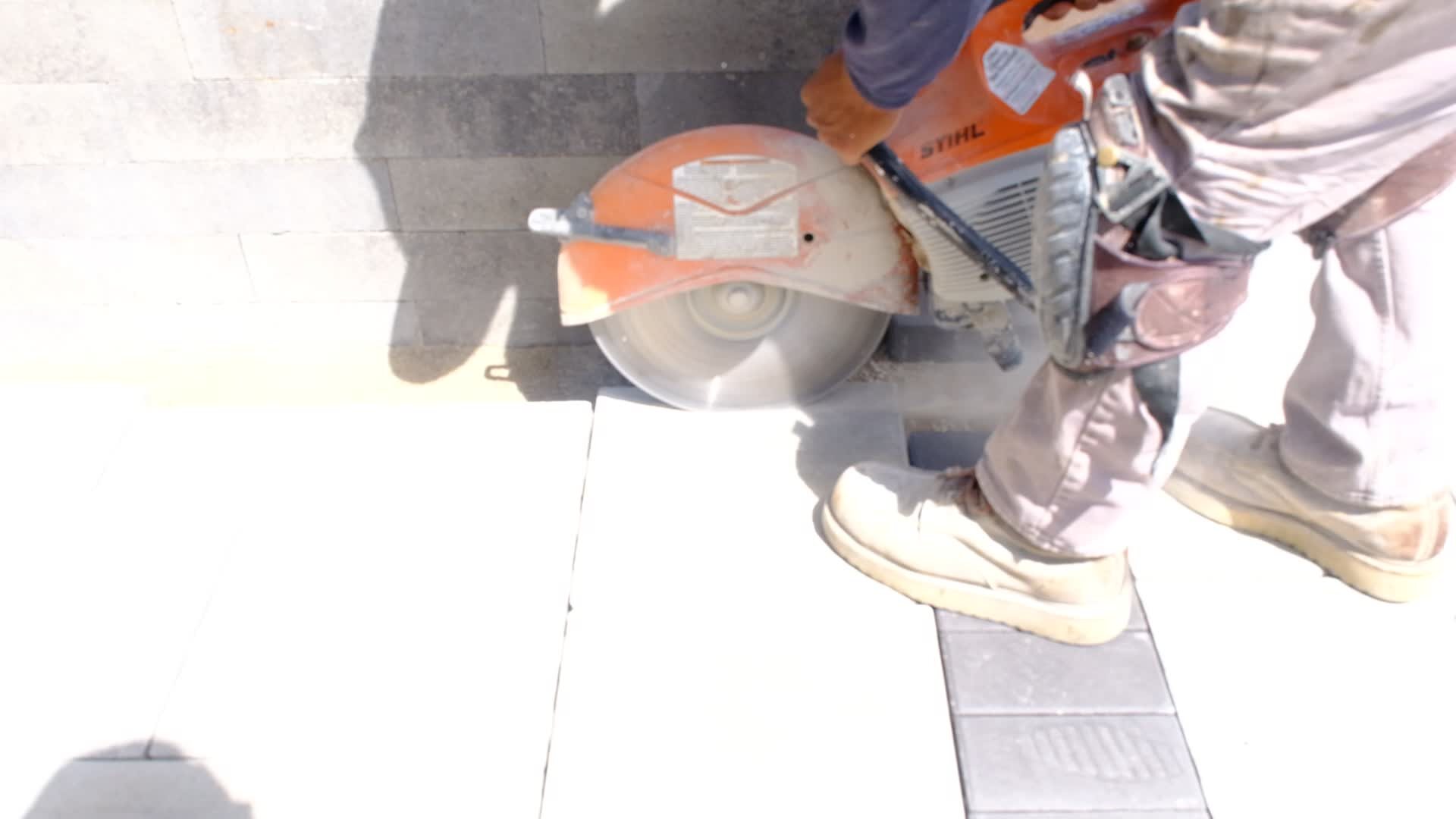 Precision saw-cutting a paver border