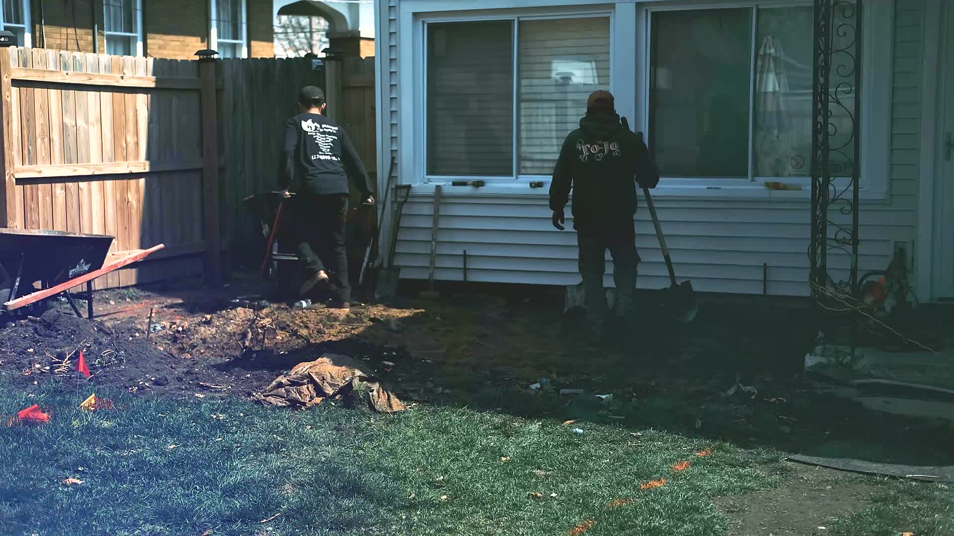 Backyard before: bare grass and dirt at day one